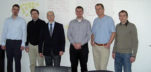 Des représentants de la Hochschule Stralsund et la direction de Projektron GmbH.