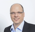Portrait of Oliver Regelmann, authorized officer and Head of Infrastructure & Collaboration at n-komm GmbH