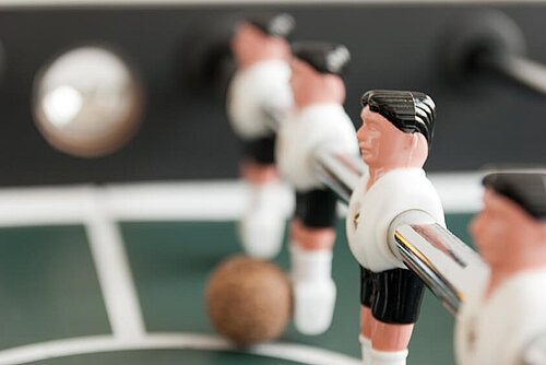 Teamgeist auch in den Pausen: unser Tischkicker Teamgeist auch in den Pausen: unser Tischkicker