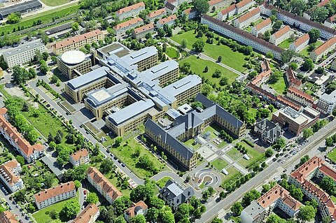 Aerial view of the BG Kliniken IT Services headquarters surrounded by residential and green areas.