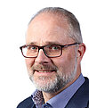 Porträt von Joachim Zaers, Principal Consultant der OneVision Healthcare GmbH. Er arbeitet mit dem Projektmanagementsystem Projektron BCS und sieht in dessen umfassender Funktionalität einen entscheidenden Vorteil für komplexe Kundenprojekte im Gesundheitswesen. Foto von Joachim Zaers, Principal Consultant bei OneVision Healthcare GmbH