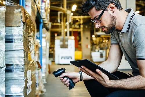 Picture shows product scan in a warehouse.